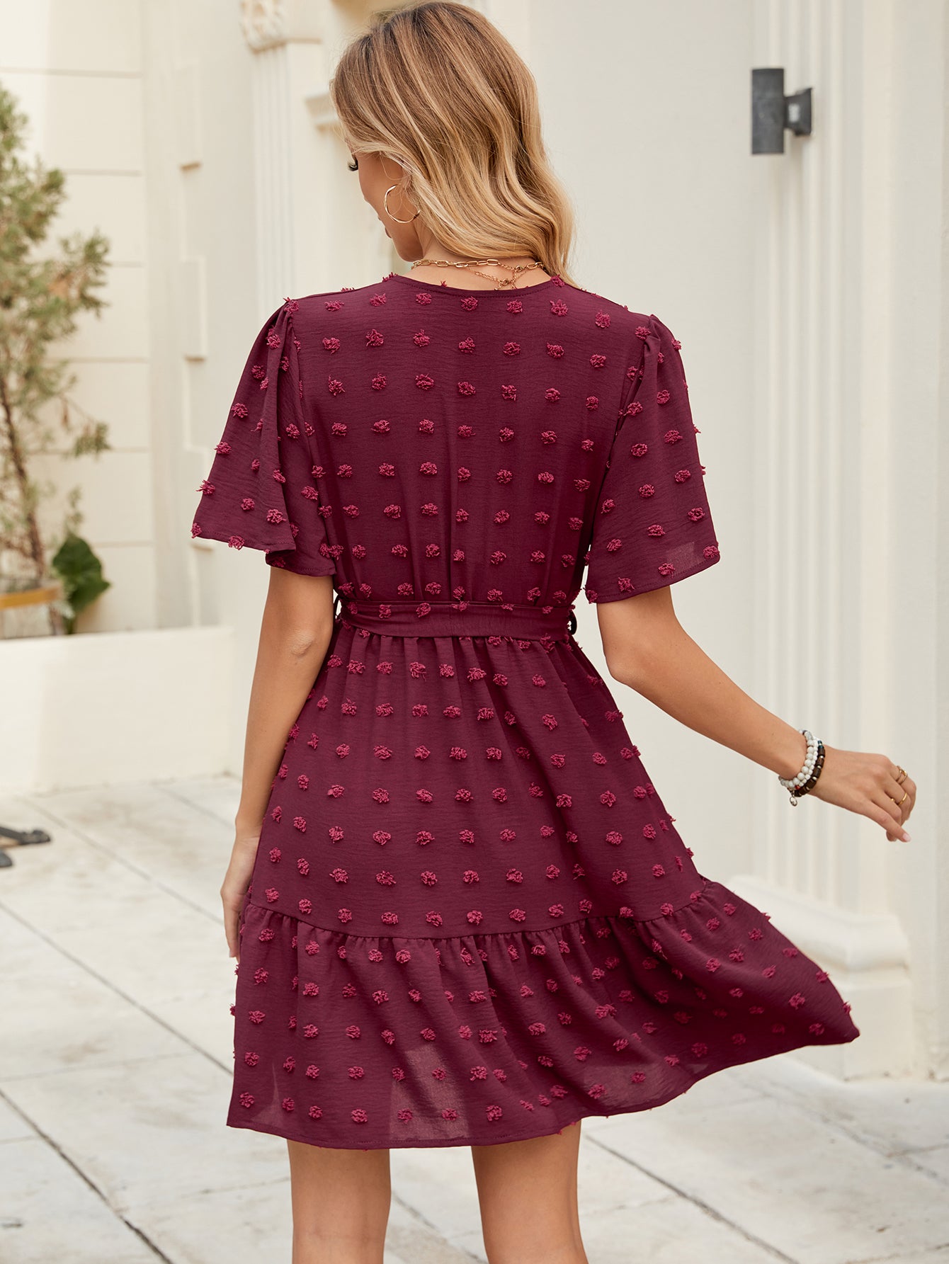 Solid V-Neck Butterfly Sleeve Belted Mini Dress in - by Malbusaat