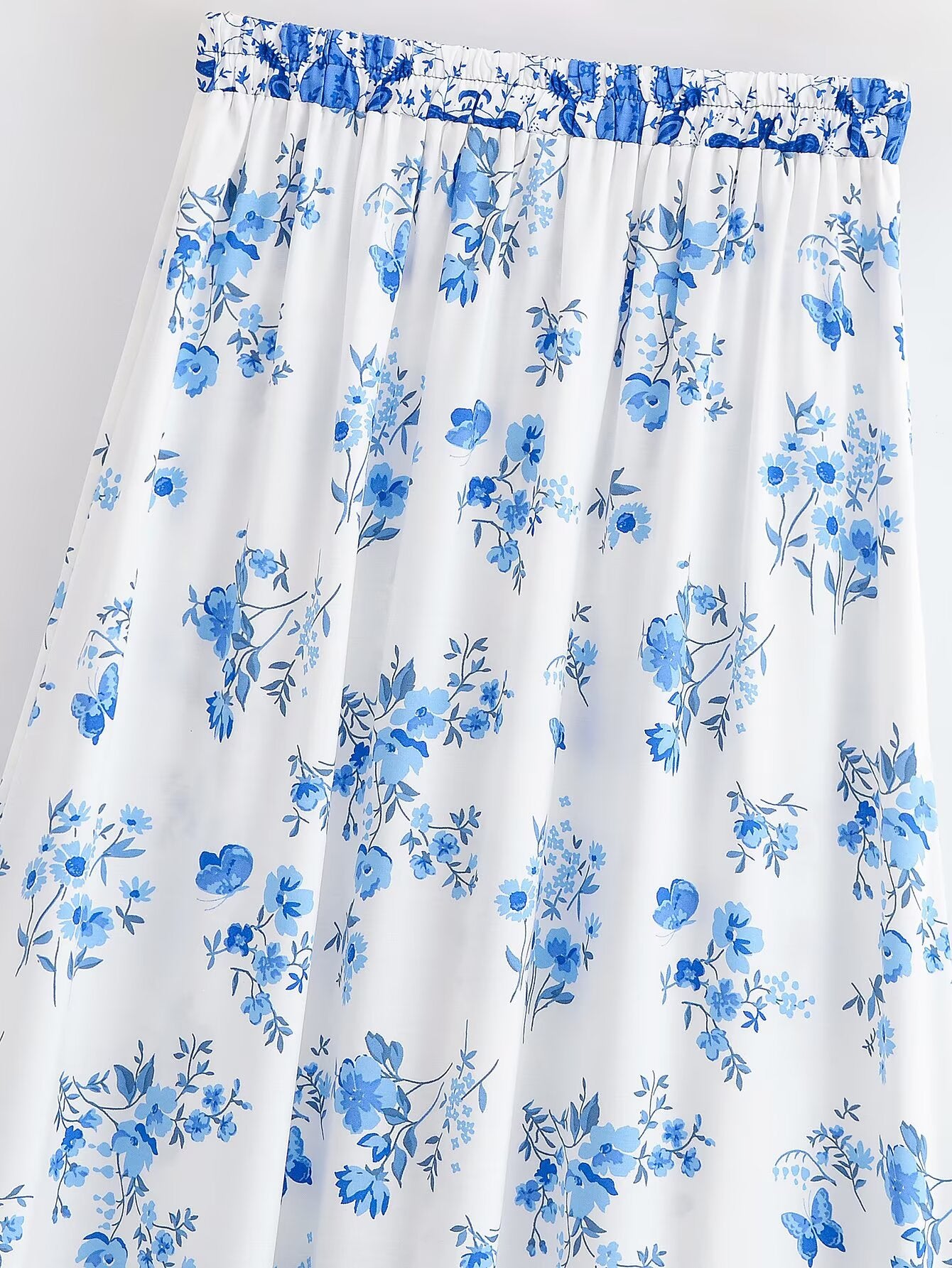Boho Floral Tassel Midi Skirt in - by Malbusaat