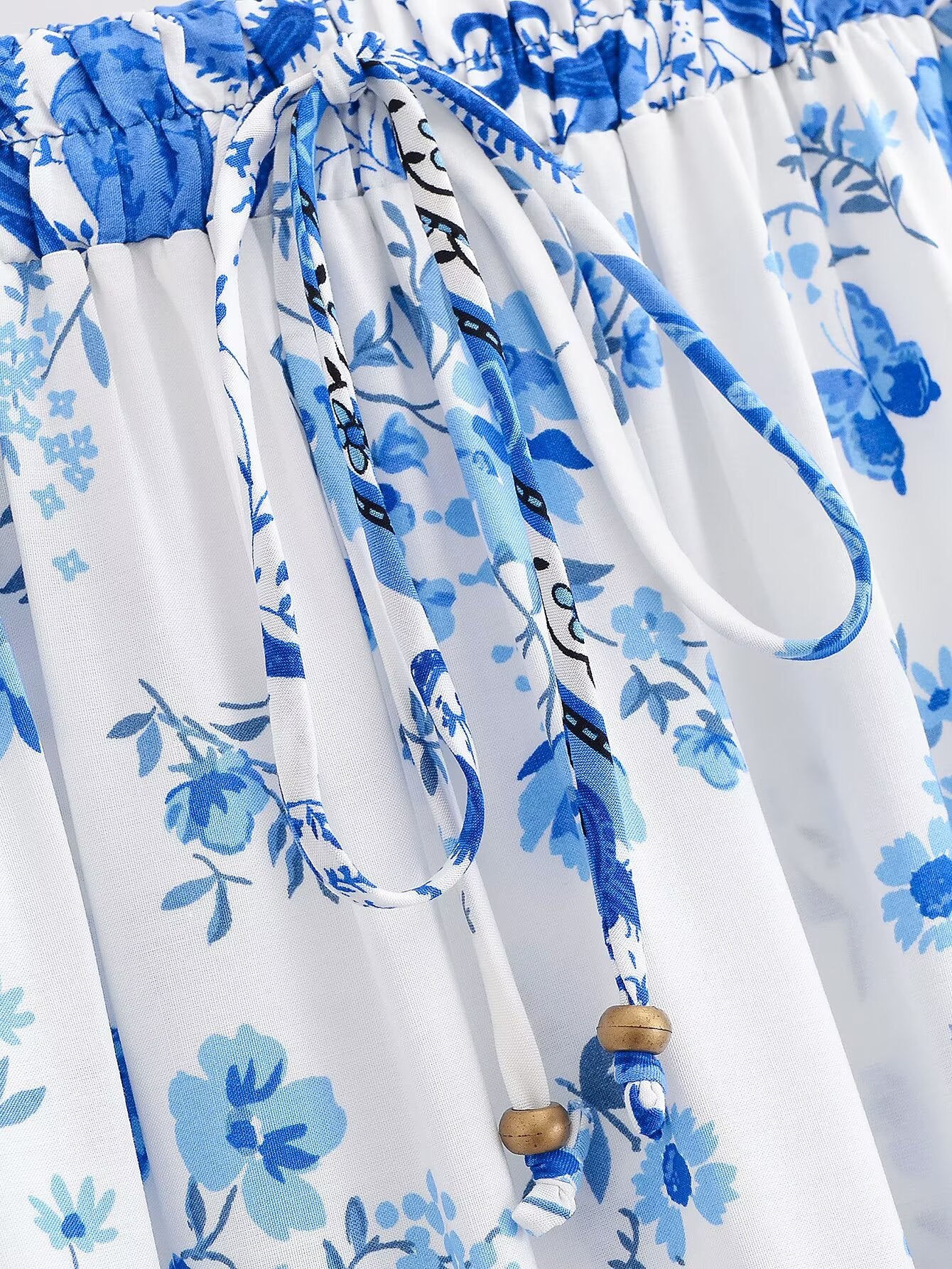 Boho Floral Tassel Midi Skirt in - by Malbusaat