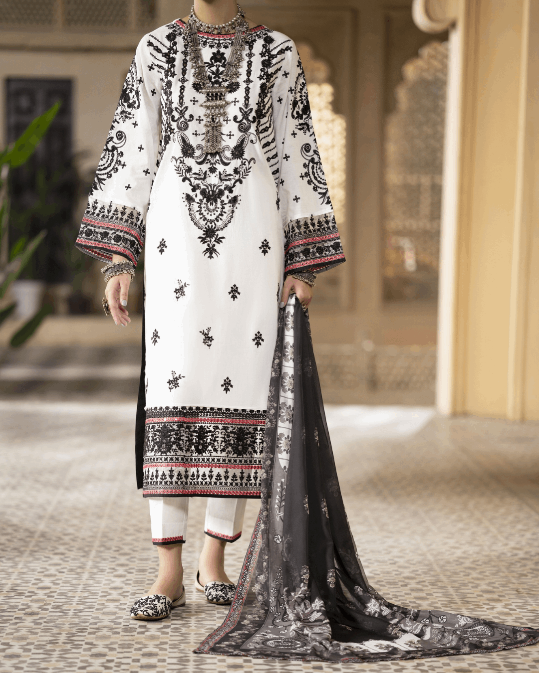 Black and White Traditional in - Pakistani Dresses by Malbusaat