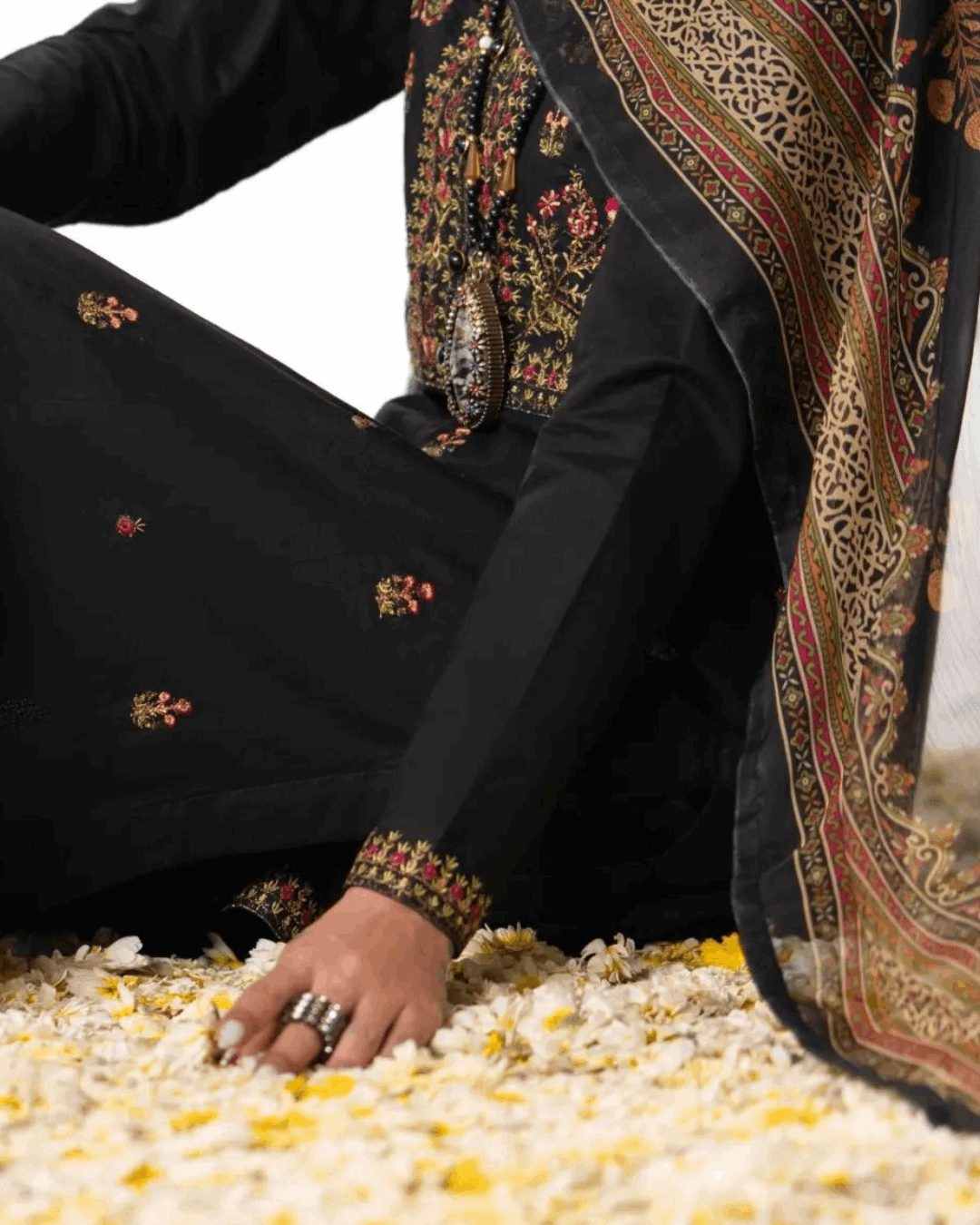Elegant Black Traditional Suit with Floral Detailing in - Pakistani Dresses by Malbusaat