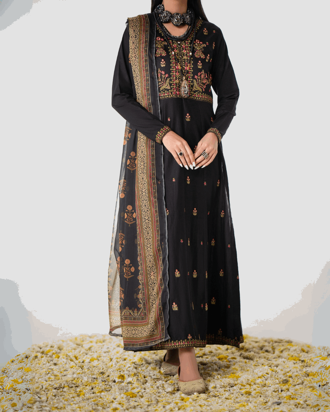 Elegant Black Traditional Suit with Floral Detailing in - Pakistani Dresses by Malbusaat