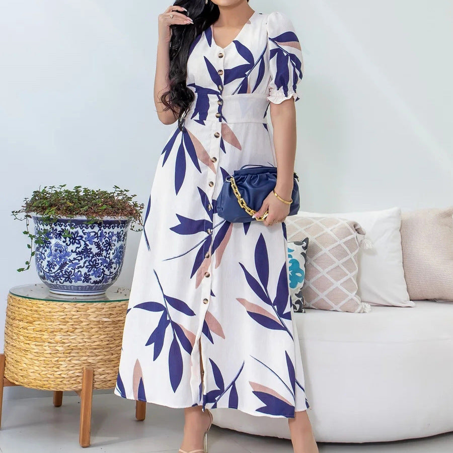 Elegant V-Neck Slimming Dress with Button and Puff Sleeves in - by Malbusaat