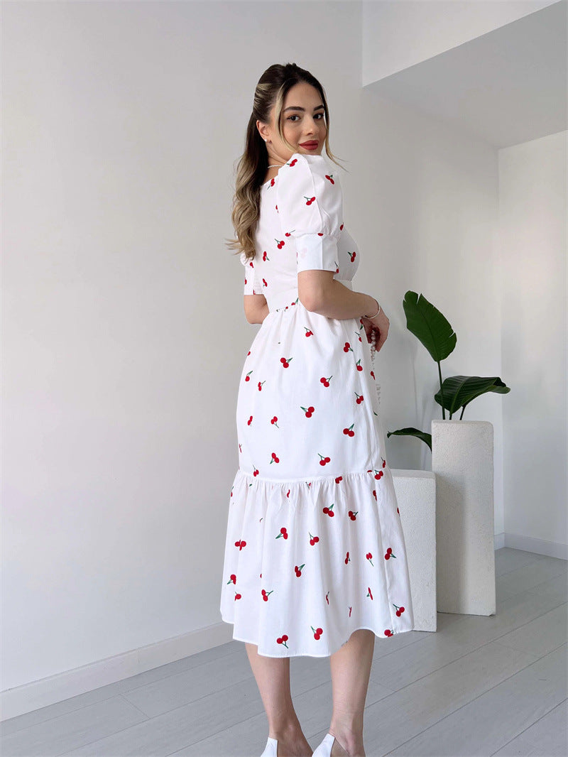 Floral Graphic Midi Dress with Square Neck and Puff Sleeves in - by Malbusaat