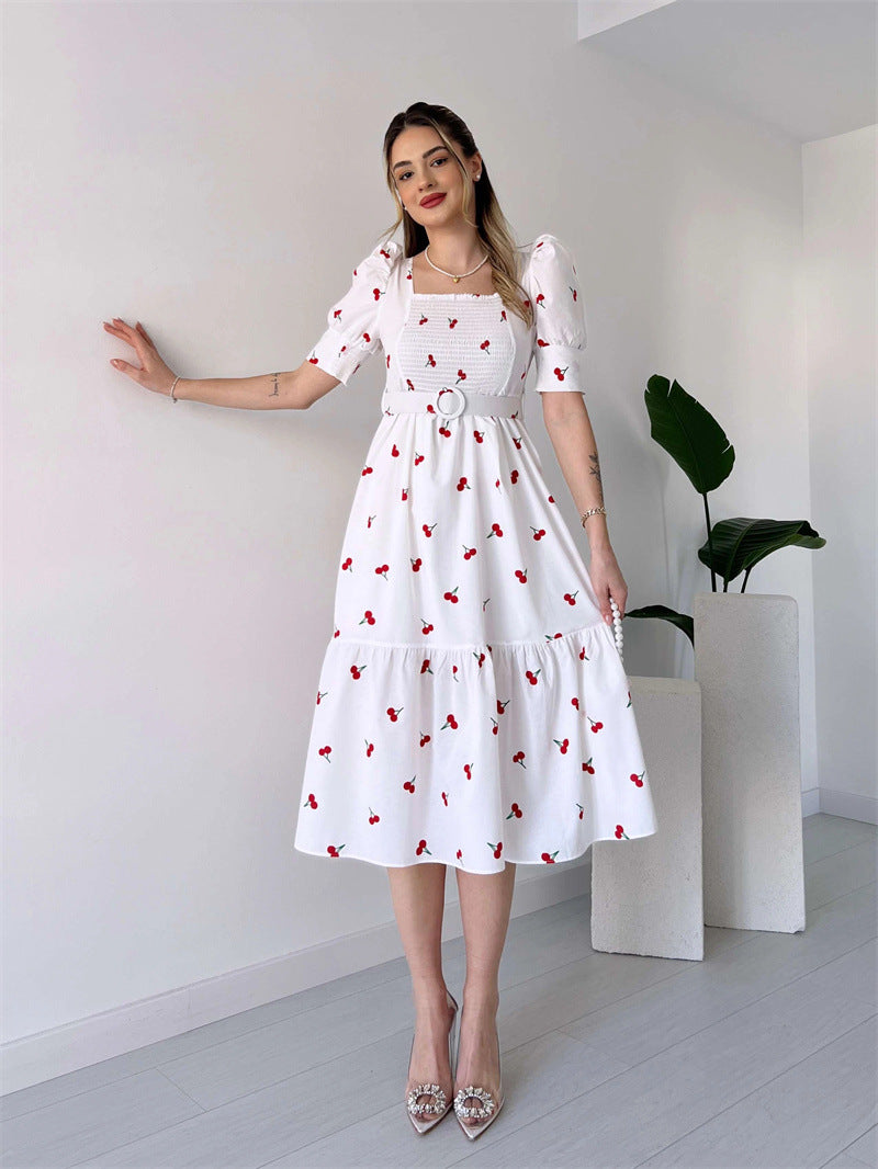 Floral Graphic Midi Dress with Square Neck and Puff Sleeves in - by Malbusaat