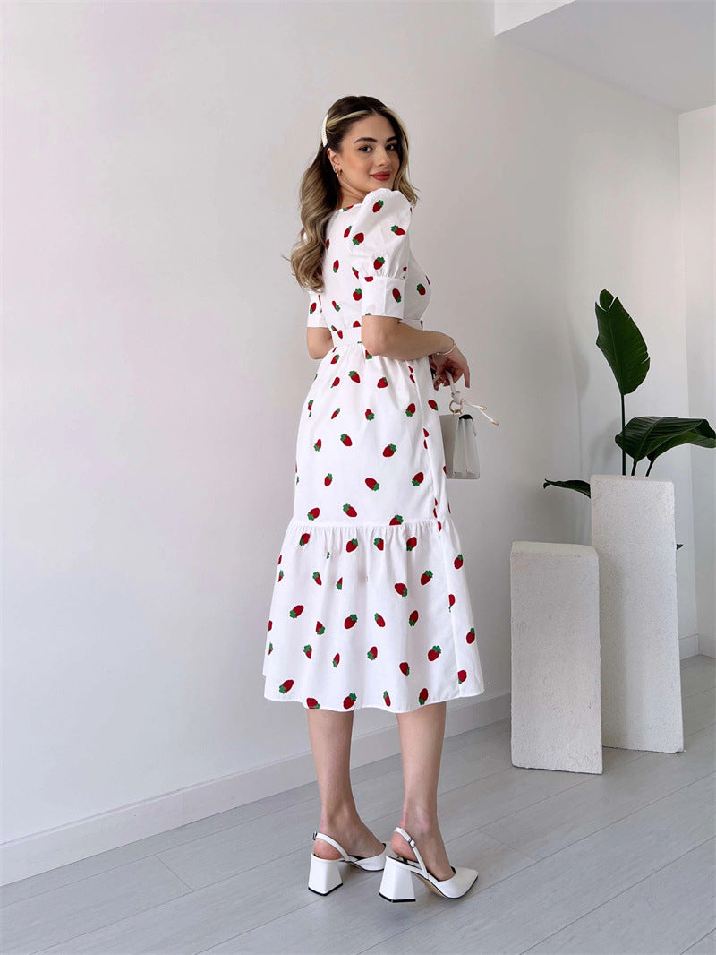 Floral Graphic Midi Dress with Square Neck and Puff Sleeves in - by Malbusaat