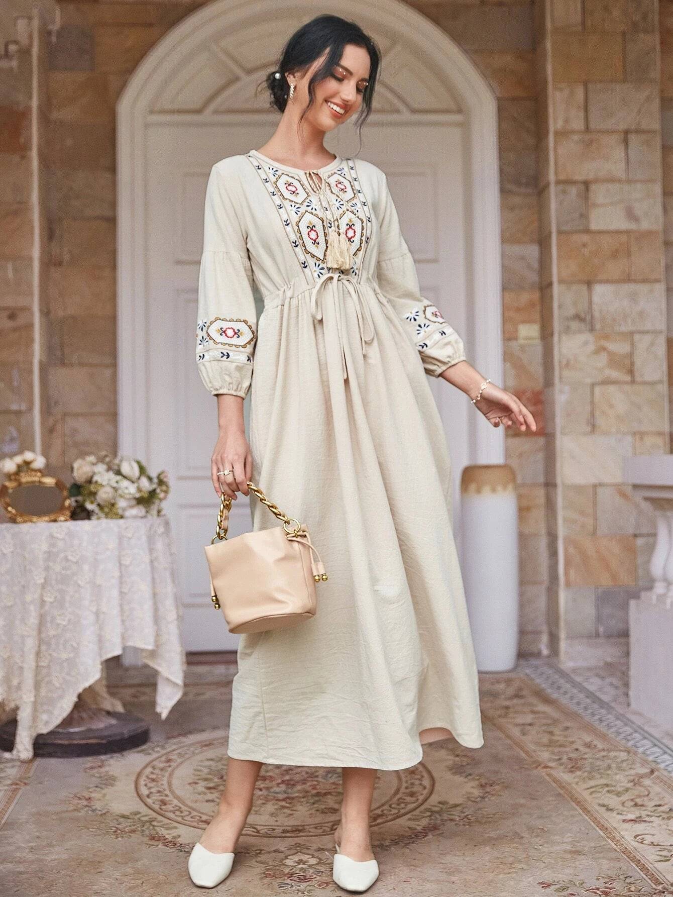 Apricot Tie Neck Floral & Geo Embroidery Drawstring Maxi Dress in - Maxi Dress by Malbusaat