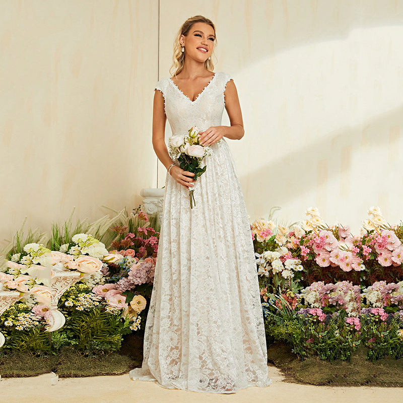 Elegant Lace Maxi Dress in White - by Malbusaat