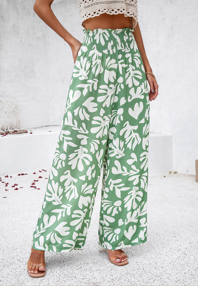 Abstract Print Smocked Waist Wide Leg Trousers in - by Malbusaat