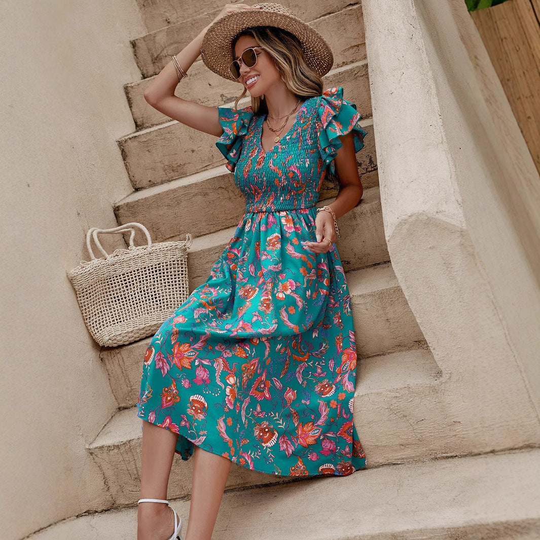 Floral V-Neck Midi Dress in - by Malbusaat
