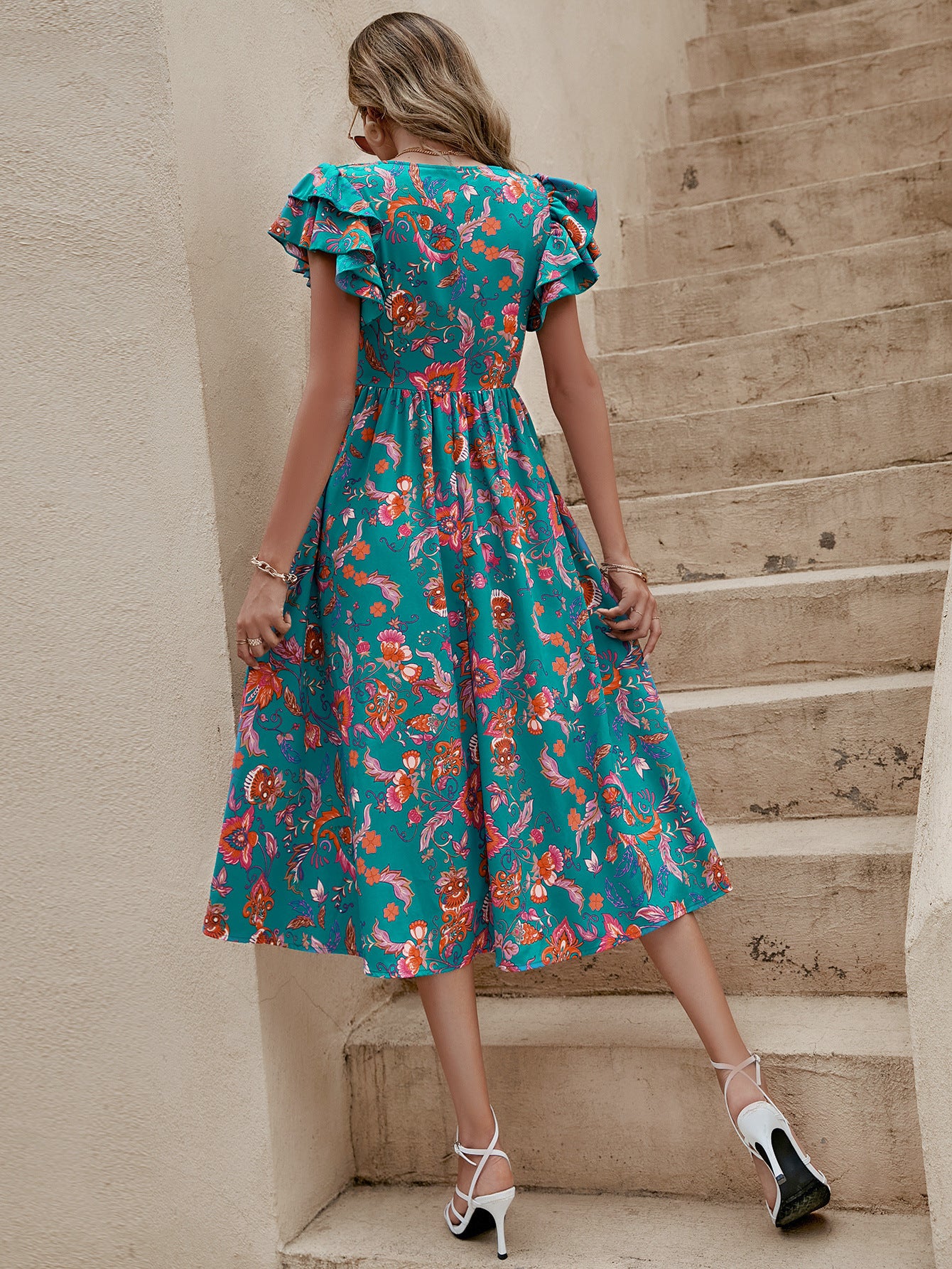 Floral V-Neck Midi Dress in - by Malbusaat