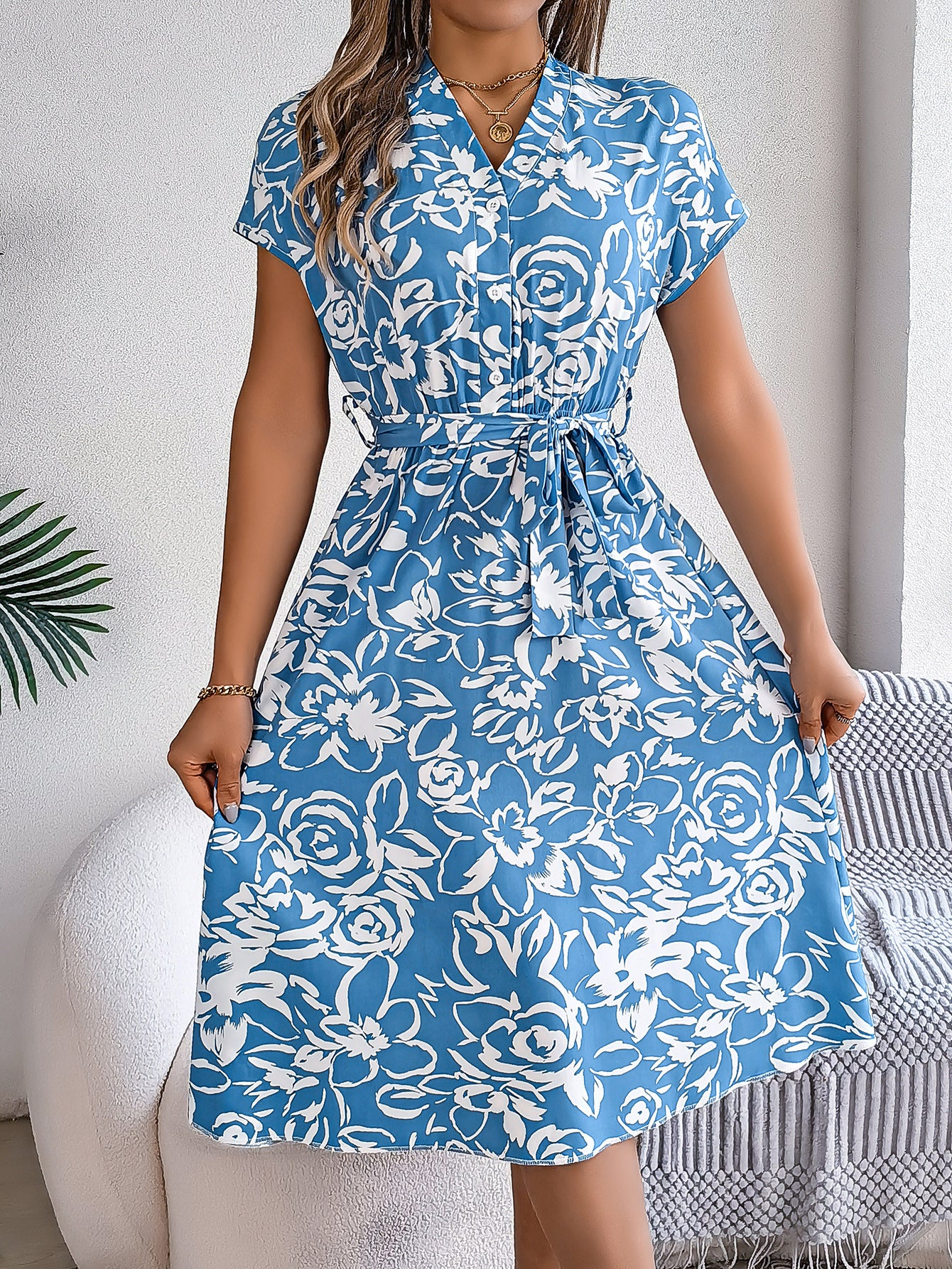 Elegant Floral Swing Dress in - by Malbusaat
