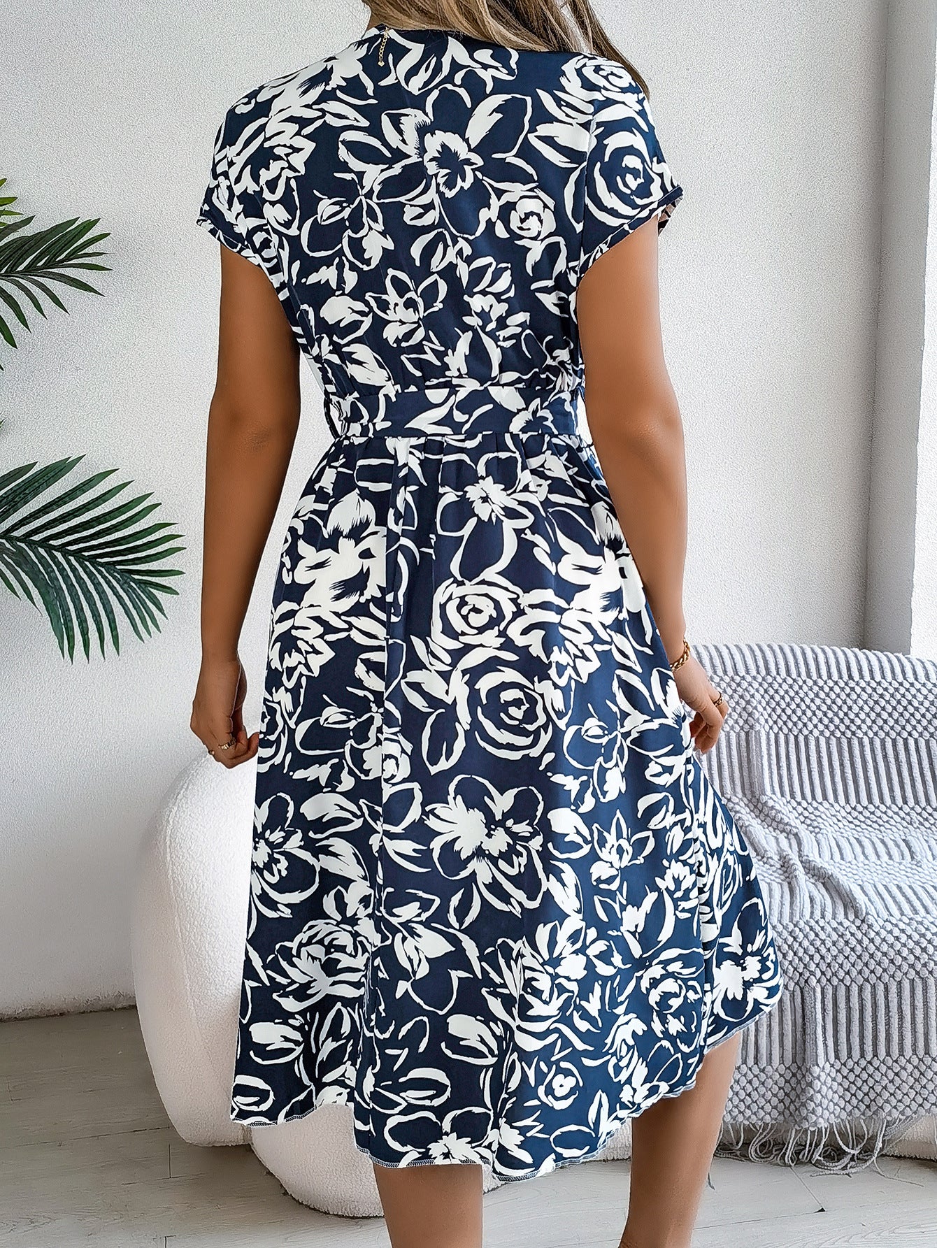 Elegant Floral Swing Dress in - by Malbusaat