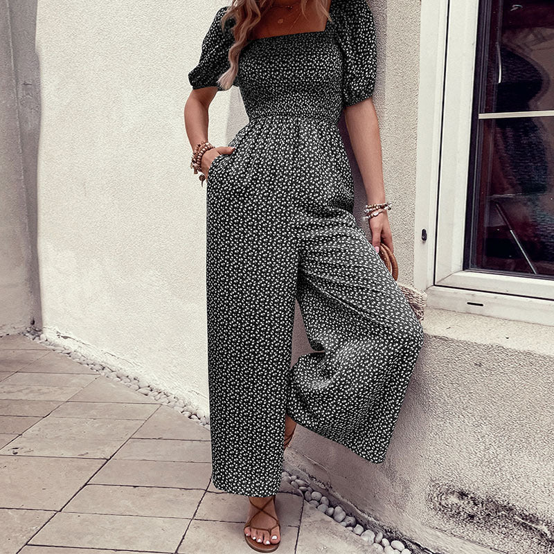 Floral Square Neck Smocked Jumpsuit in Black - by Malbusaat