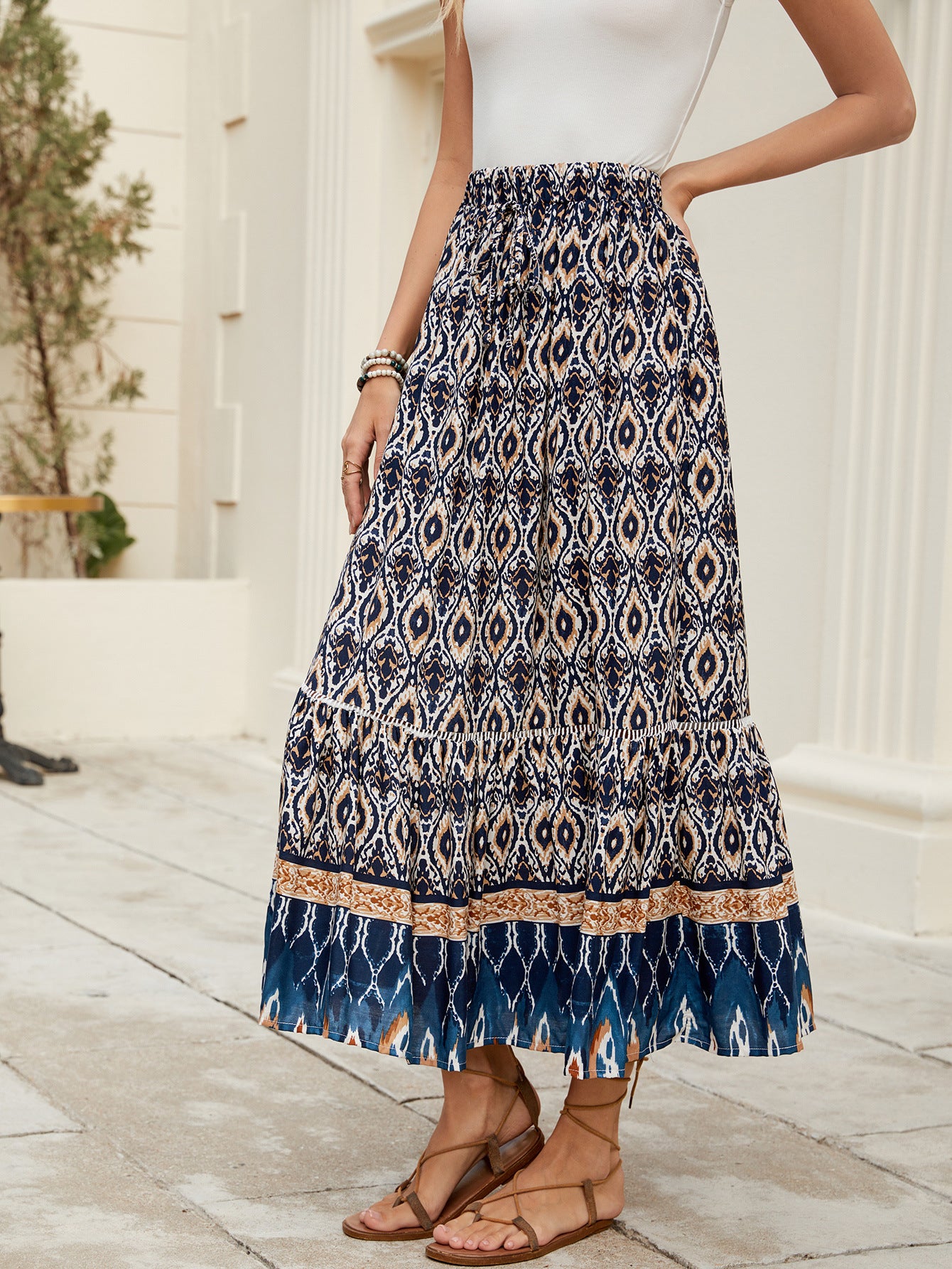 Elegant Boho Printed High-Rise Maxi Swing Skirt in - by Malbusaat