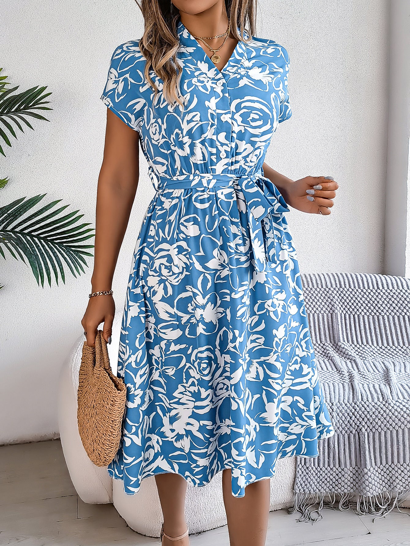 Elegant Floral Swing Dress in Light Blue - by Malbusaat