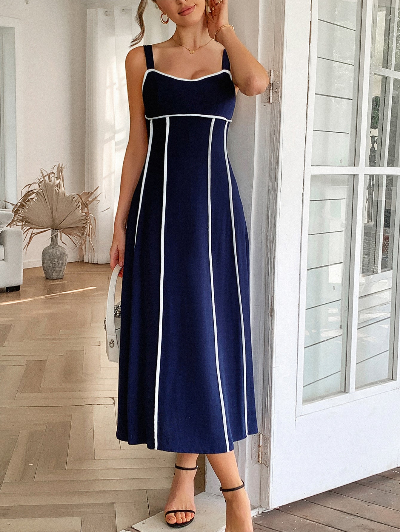 Striped Sleeveless Midi Dress in - by Malbusaat