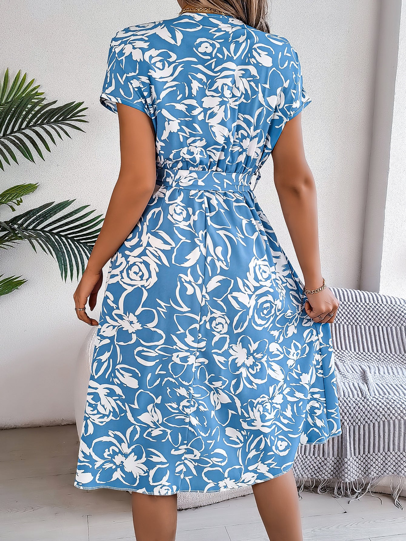 Elegant Floral Swing Dress in - by Malbusaat