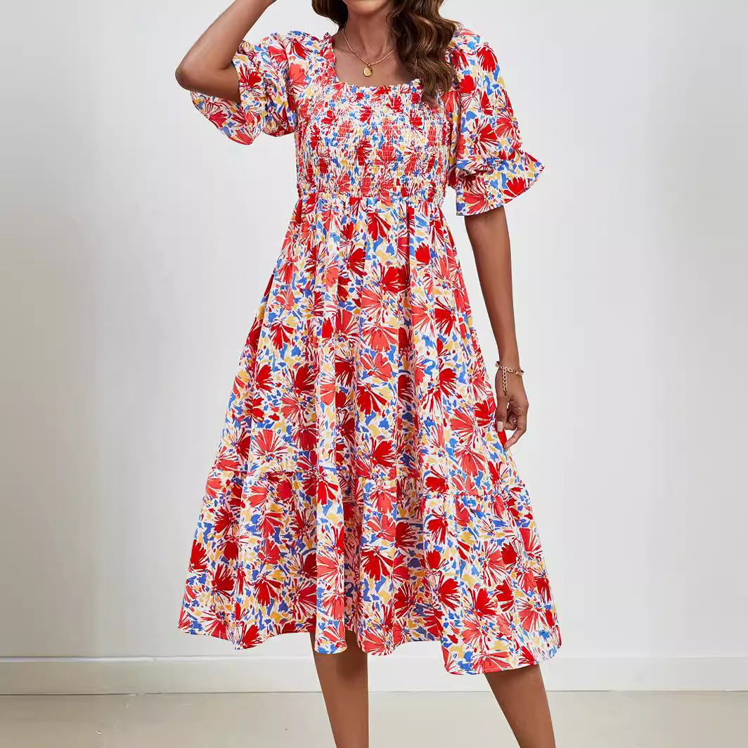 Pleated Puff Sleeve Smocked Floral Dress in - by Malbusaat