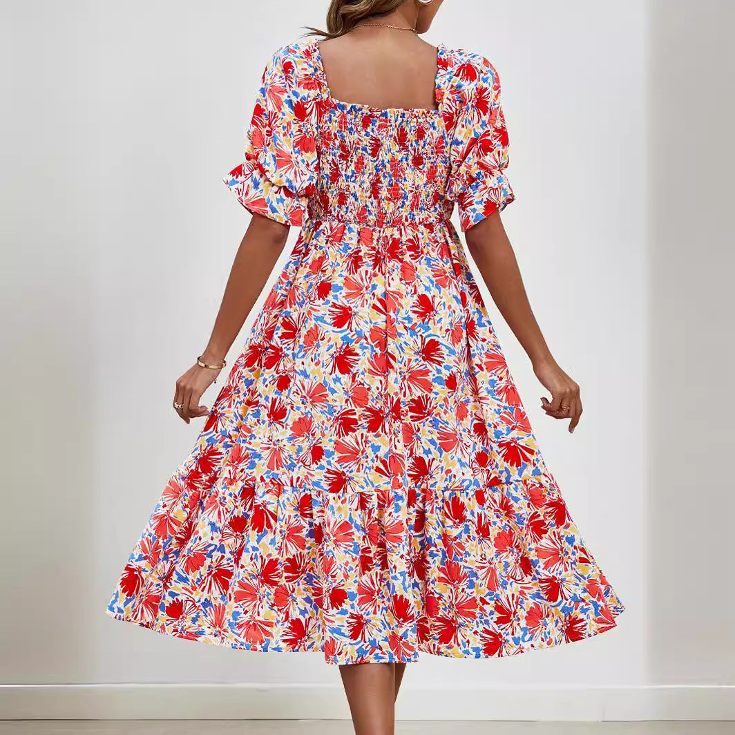 Pleated Puff Sleeve Smocked Floral Dress in - by Malbusaat