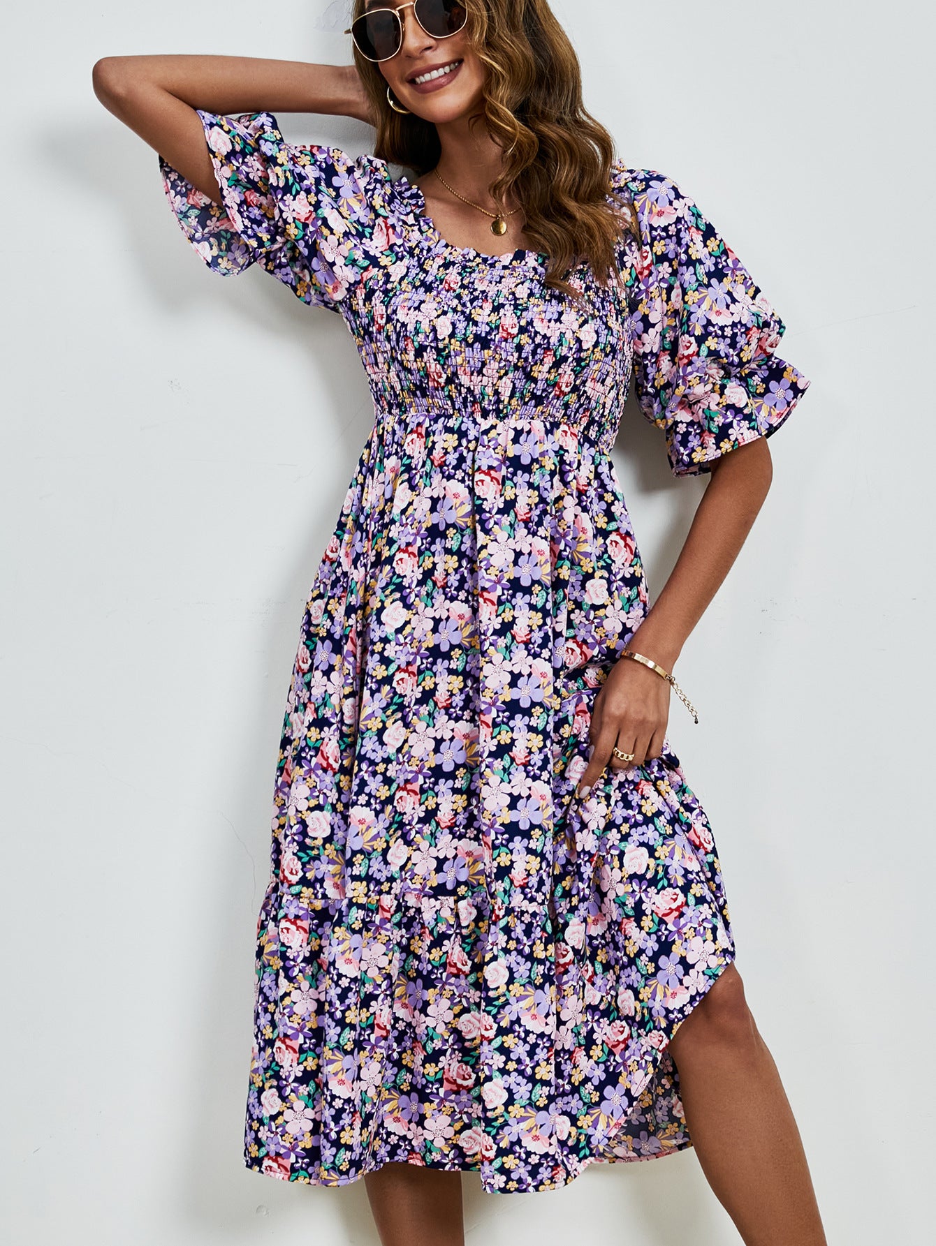 Pleated Puff Sleeve Smocked Floral Dress in - by Malbusaat