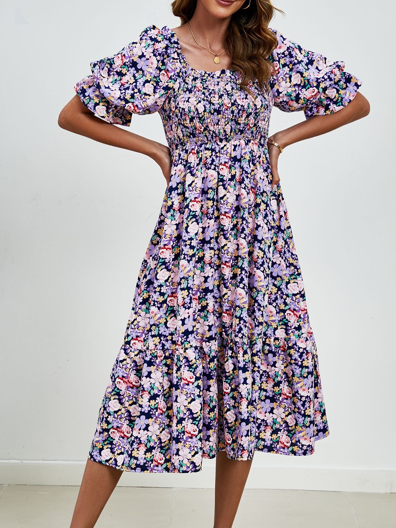 Pleated Puff Sleeve Smocked Floral Dress in - by Malbusaat