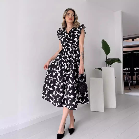 Printed V-Neck Belted Maxi Dress in - by Malbusaat