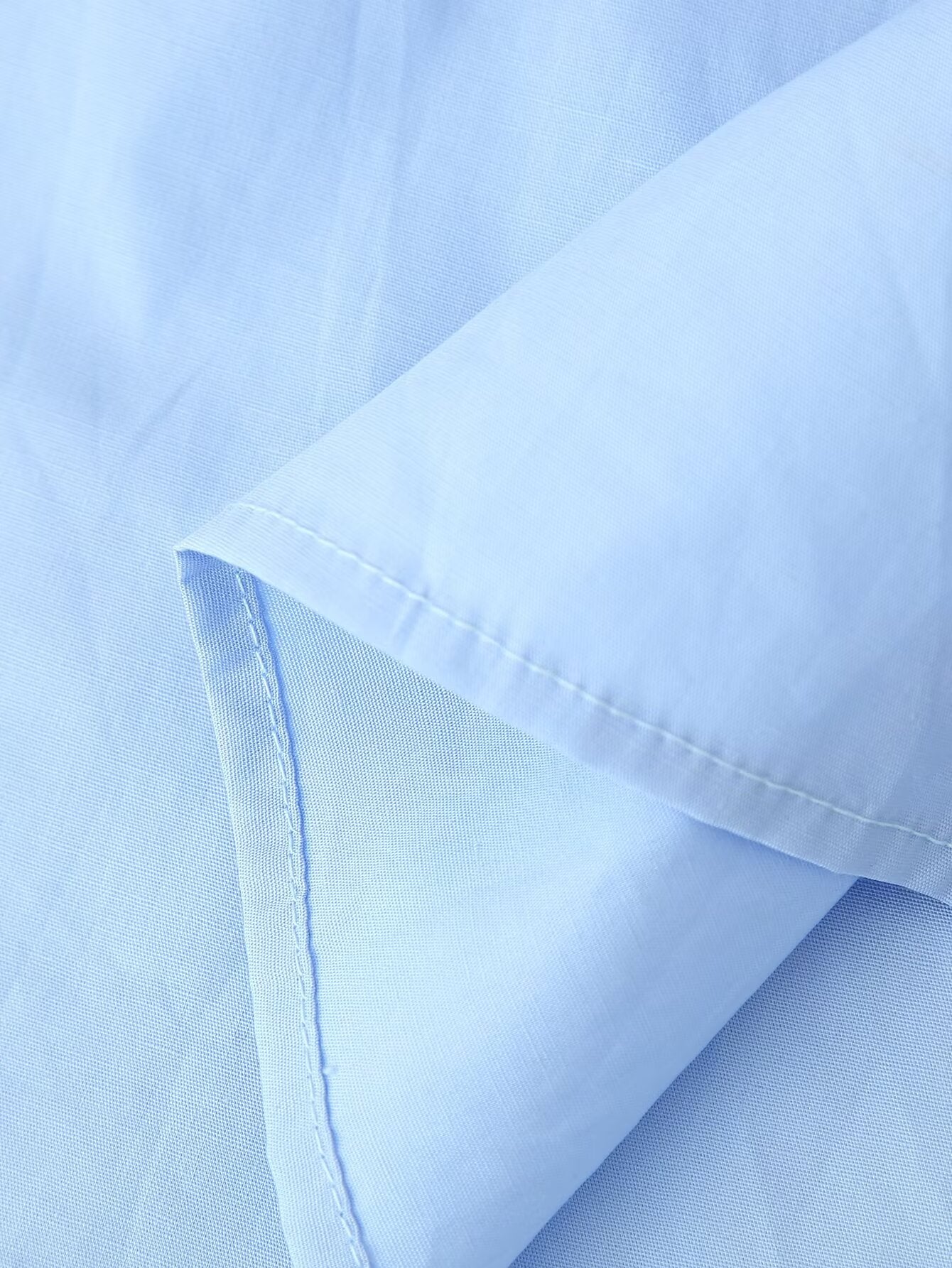 Malbusaat light blue cotton puff sleeve round neck maxi dress close up of hem and stitching detail