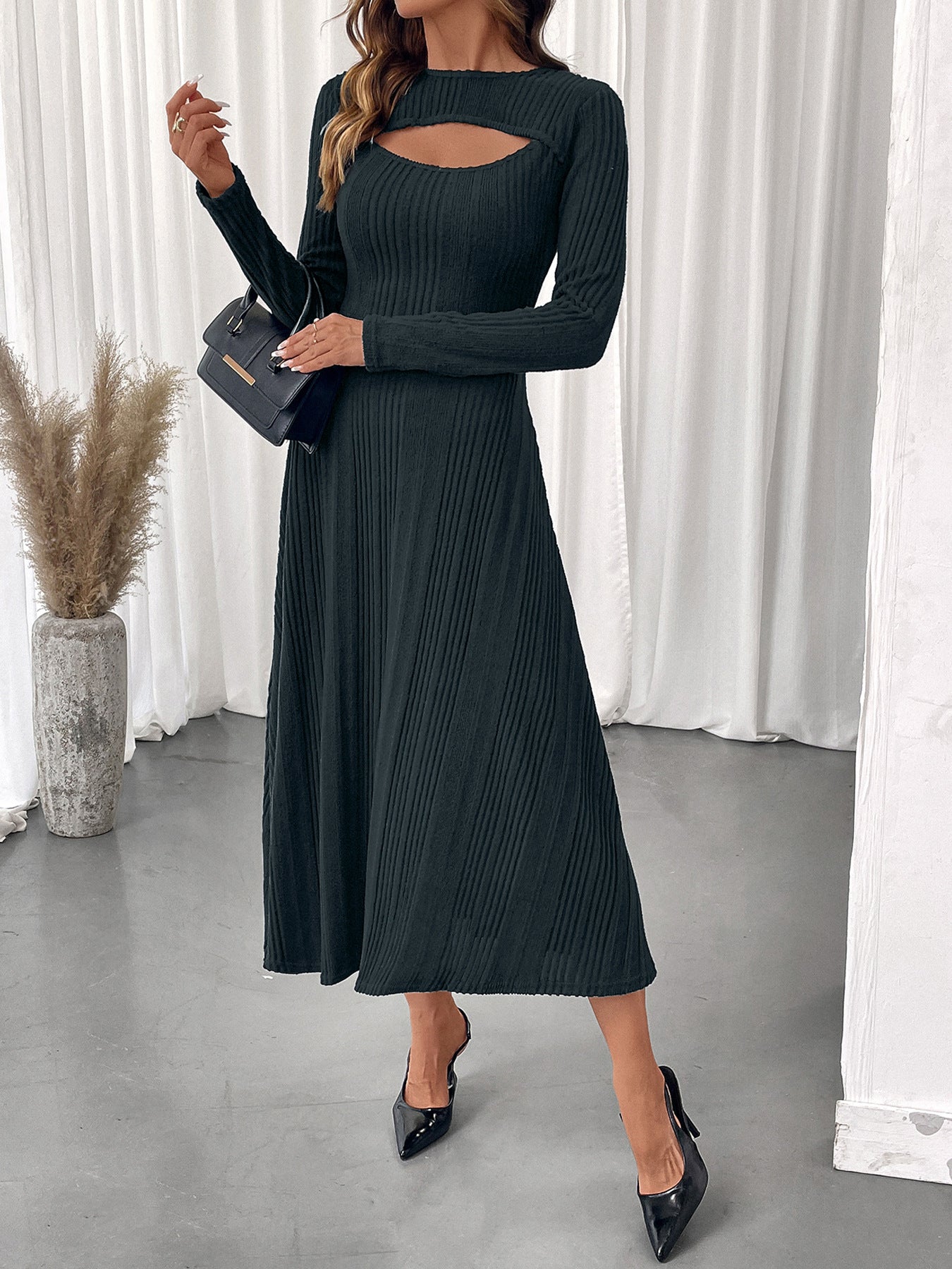 Malbusaat autumn slim fit midi dress in black with long sleeves and chest cutout detail