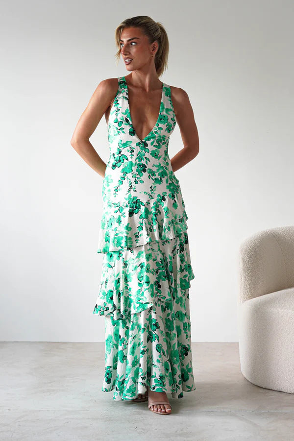 Malbusaat Backless Deep V Plunge Summer Vacation Maxi dress with green floral print and tiered ruffle skirt