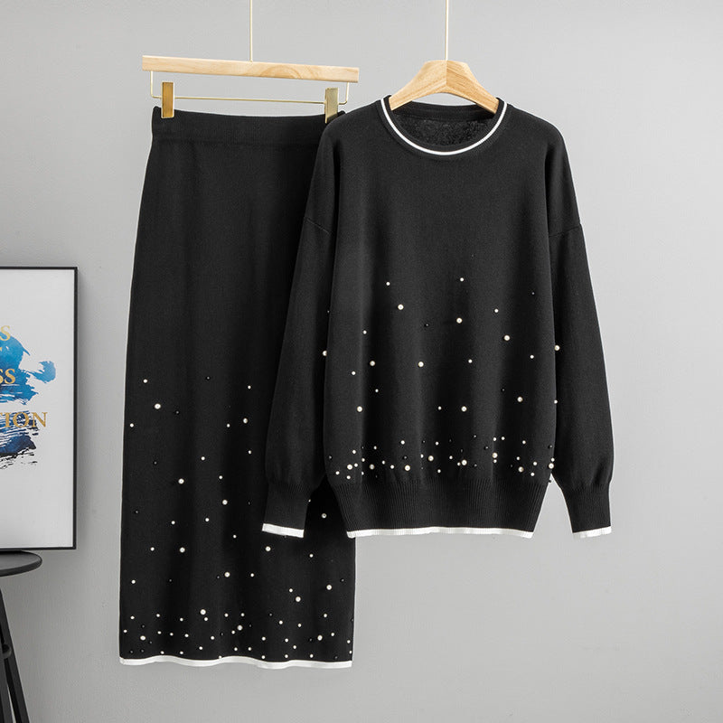 Stylish black beaded knit co ord set featuring a sweater and matching skirt with embellishments