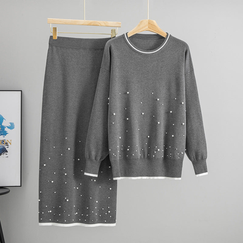 Malbusaat beaded knit co ord set in grey with a sweater and matching skirt featuring decorative beads
