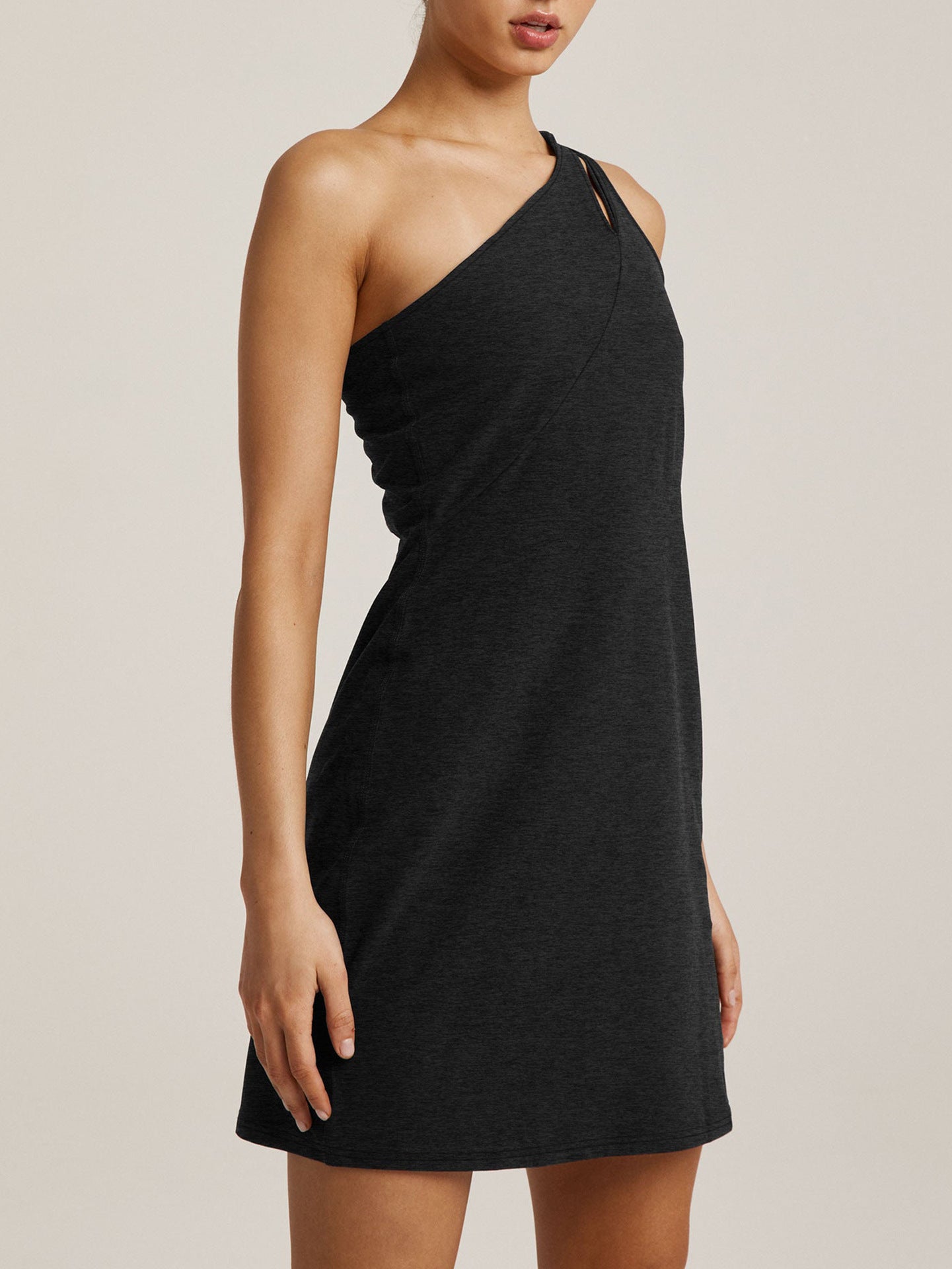 Malbusaat black sling mini dress with one shoulder design and fitted silhouette