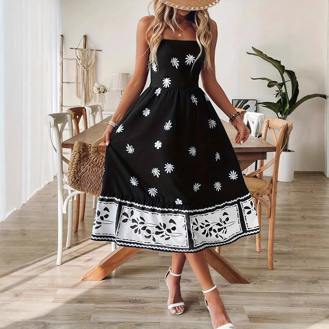 Malbusaat women's printed summer midi dress in black with white floral patterns and sleeveless design