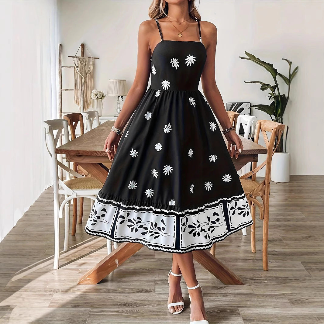 Malbusaat women's printed summer midi dress in black with white floral patterns and spaghetti straps