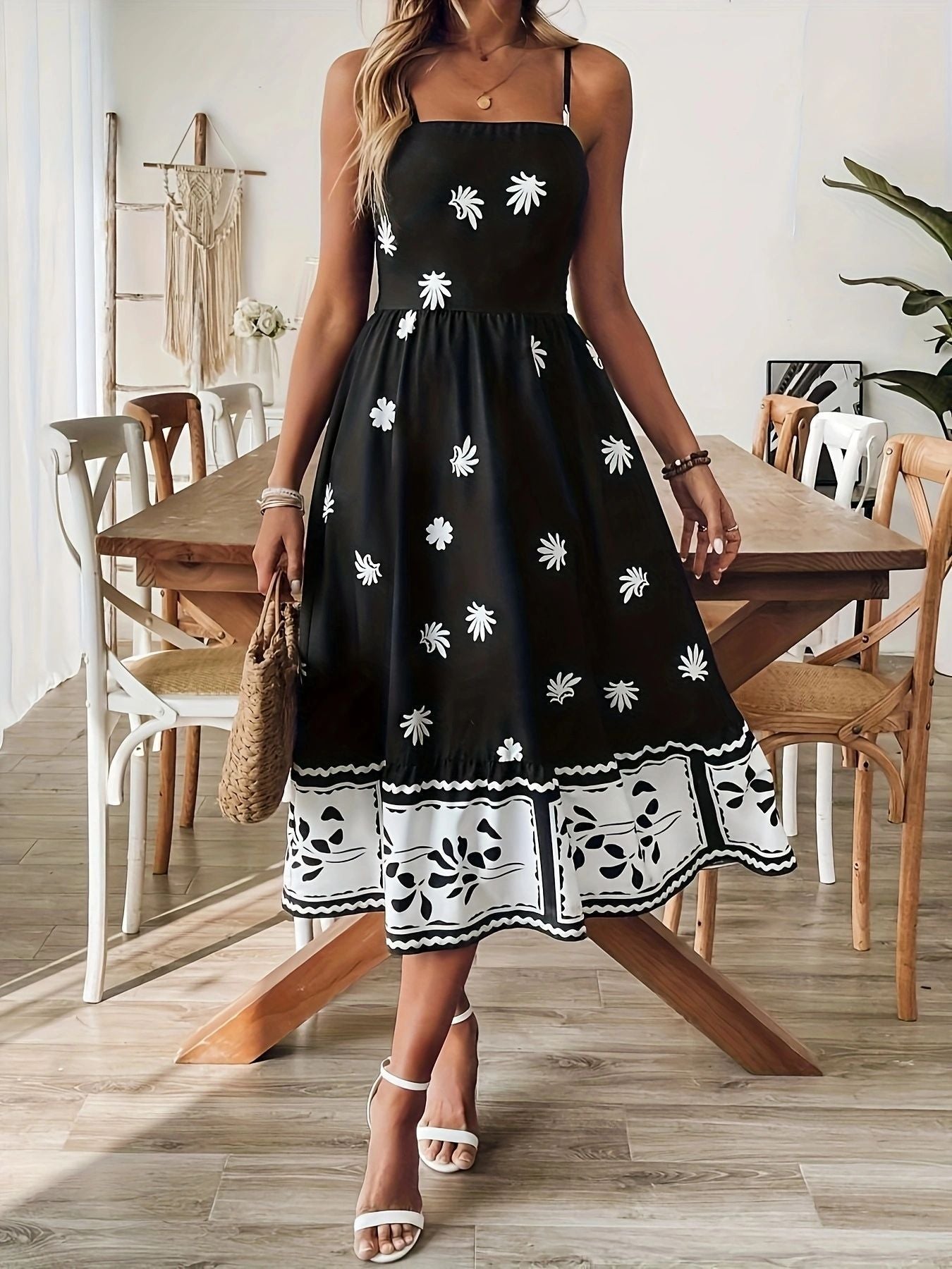 Malbusaat women's printed summer midi dress in black with white floral patterns spaghetti straps