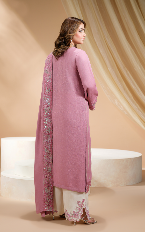 Blush Mauve Embroidered Dhanak Suit by Malbusaat with elegant detailing and a stylish silhouette