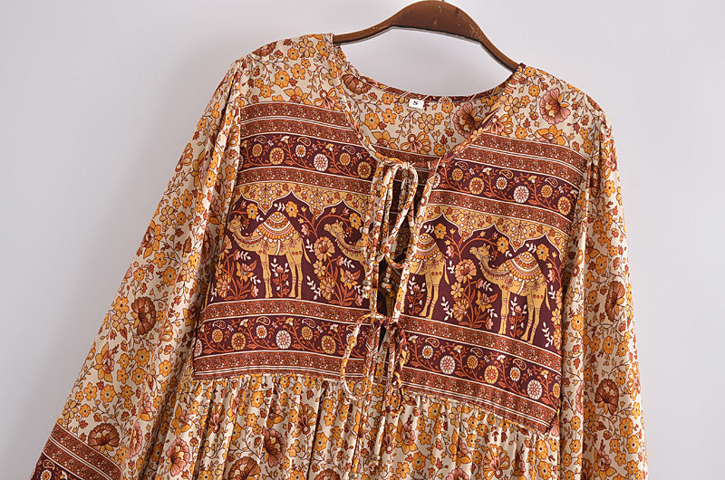 Boho floral dress online UK with intricate camel and maroon elephant print by Malbusaat