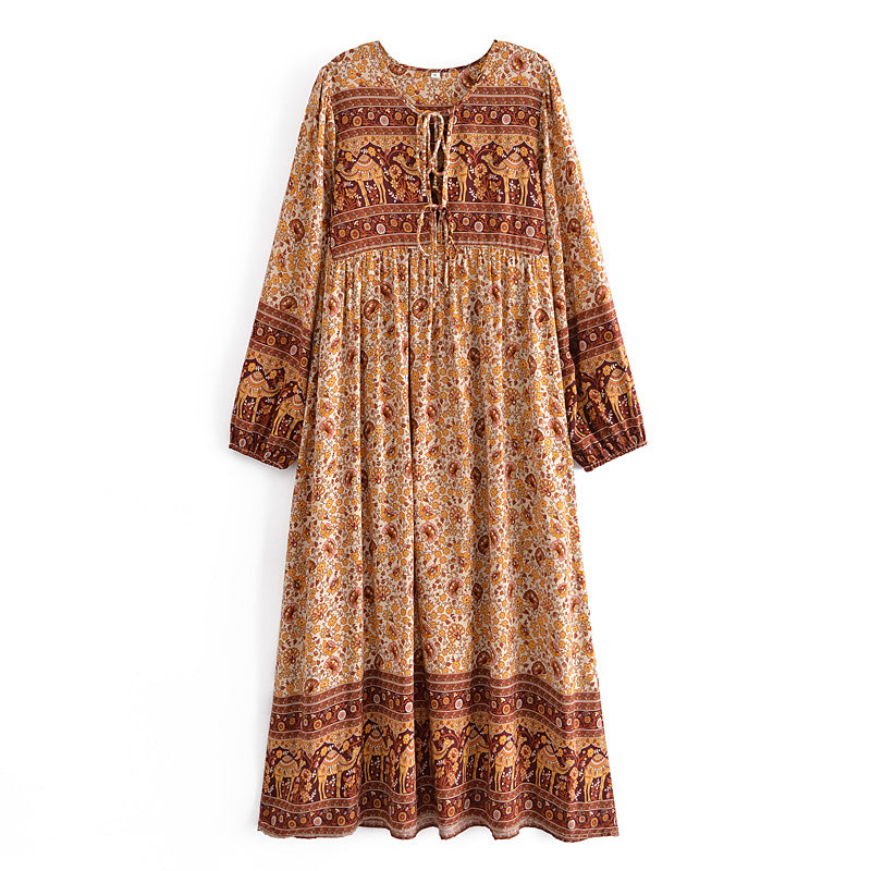 Malbusaat boho floral dress online UK featuring long sleeves and intricate ethnic patterns in warm tones