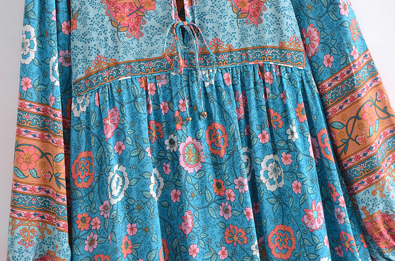 Malbusaat lace up crew neck maxi dress for women featuring blue floral print and long sleeves