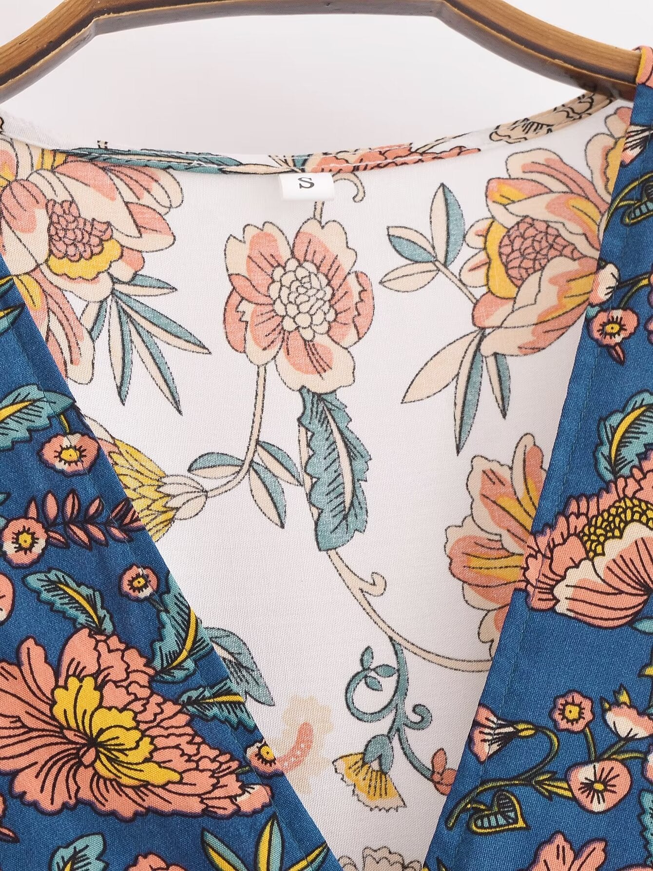Malbusaat long sleeve floral summer dress UK with colourful flower patterns on blue fabric