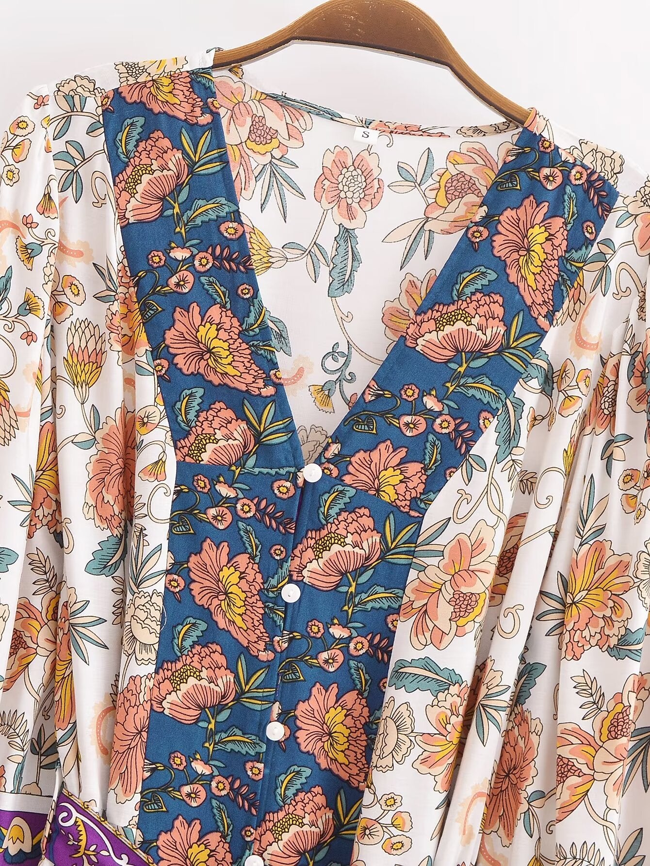 Malbusaat long sleeve floral summer dress UK with buttoned front and mixed floral patterns in soft colours