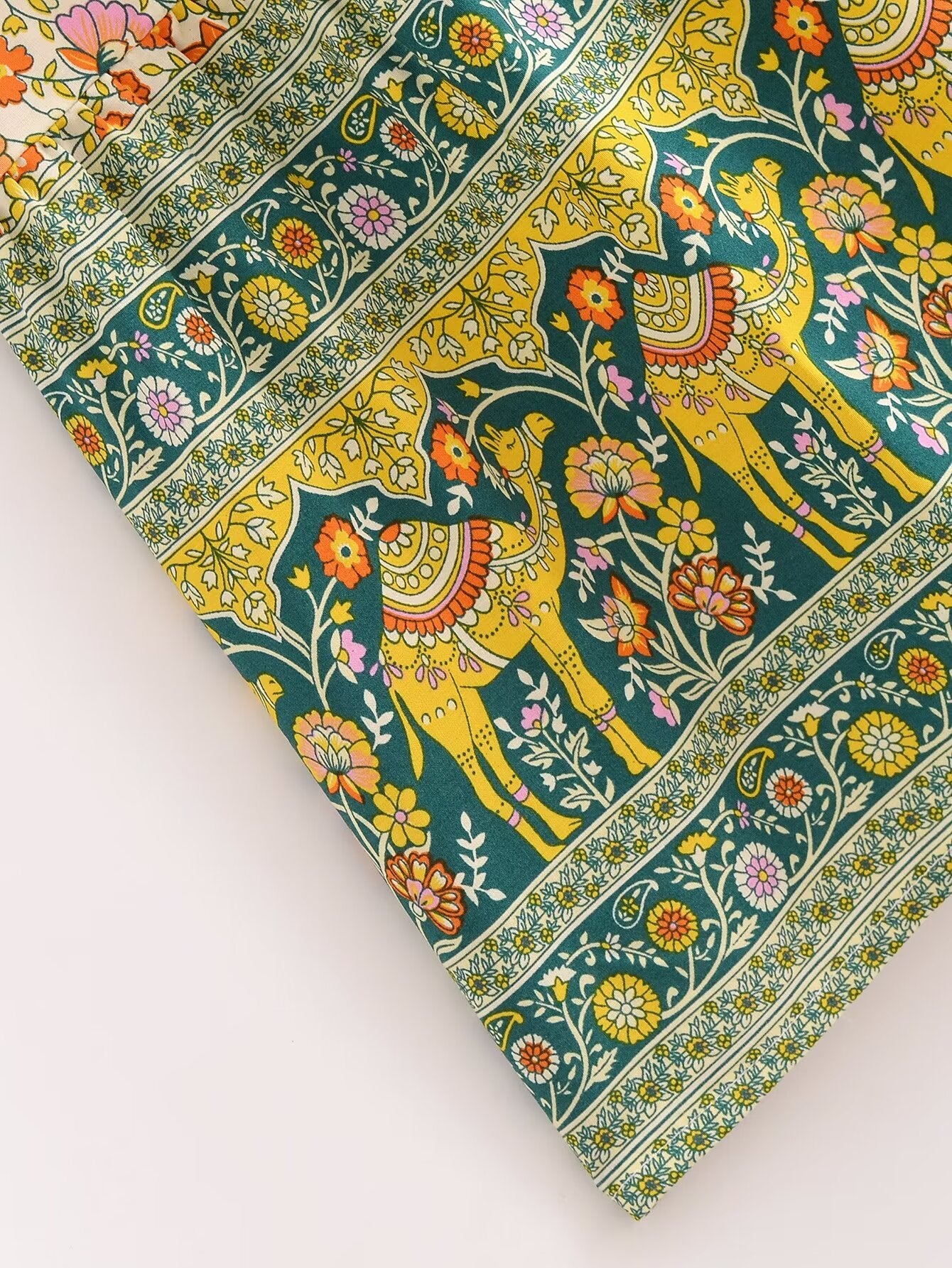 Malbusaat rayon floral maxi dress fabric showing detailed yellow and green elephant and floral print design