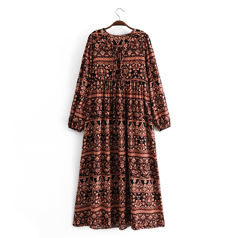 Malbusaat loose fit printed holiday dress with long sleeves and boho pattern on hanger