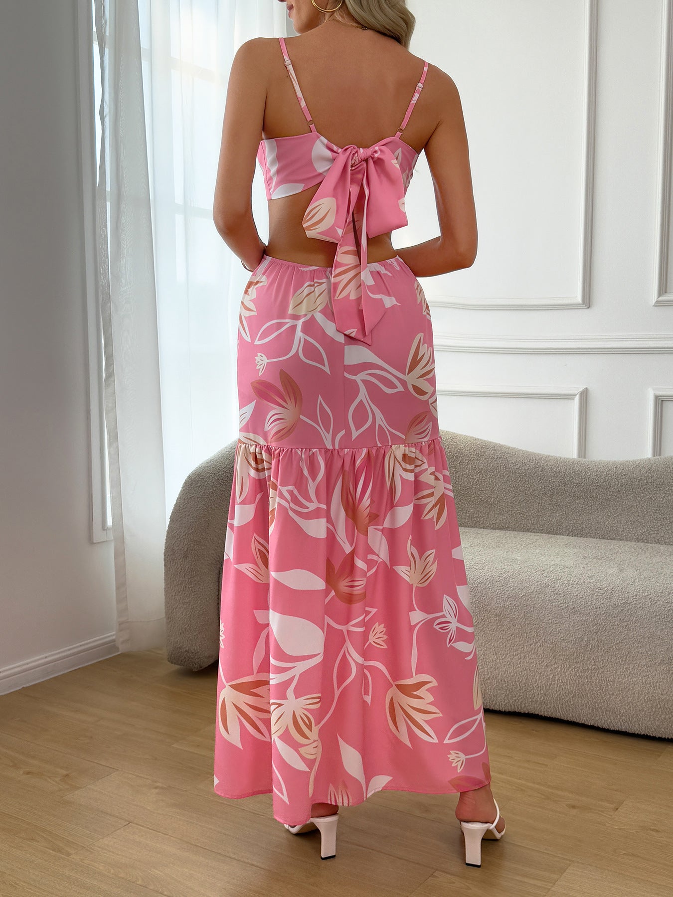 Malbusaat cutout floral camisole dress in pink floral pattern with tie back design