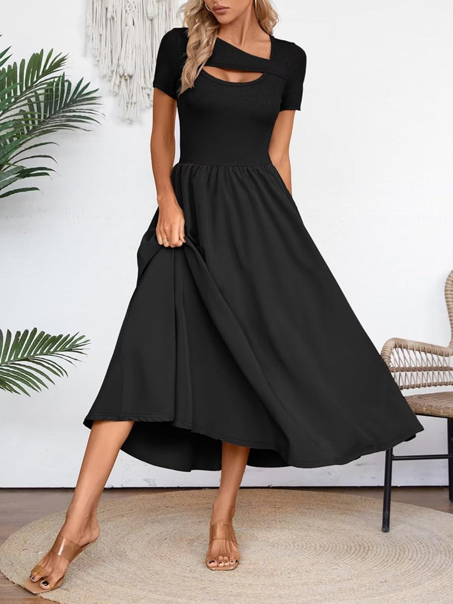 Elegant black midi dress for summer with short sleeves and cutout neckline by Malbusaat
