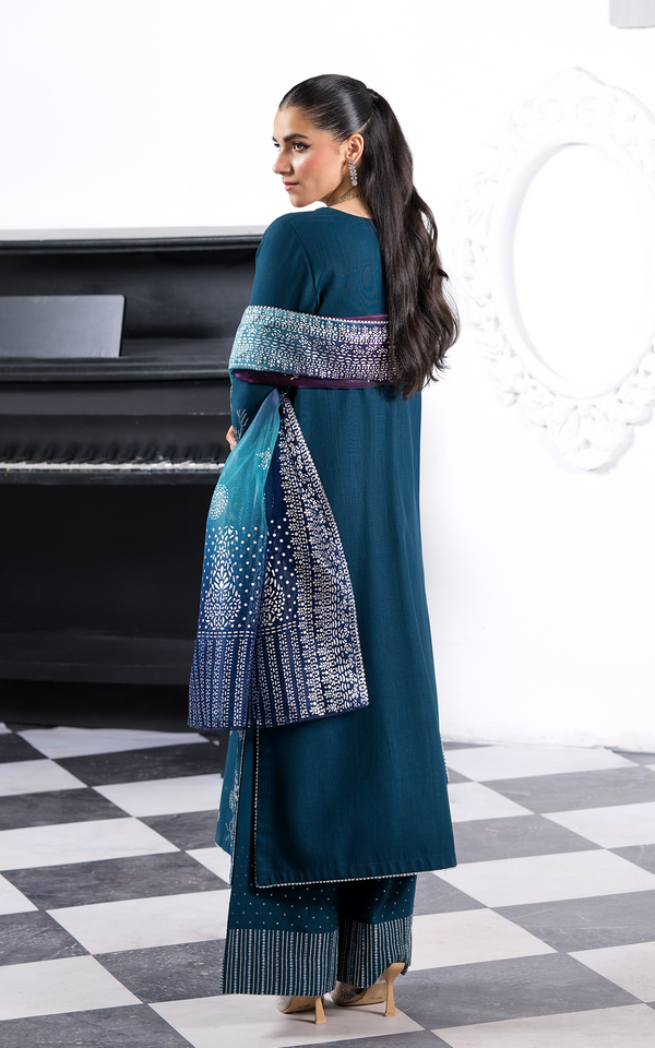 Emerald Dream Khaddar Embroidered Suit featuring elegant designs and a stylish silhouette