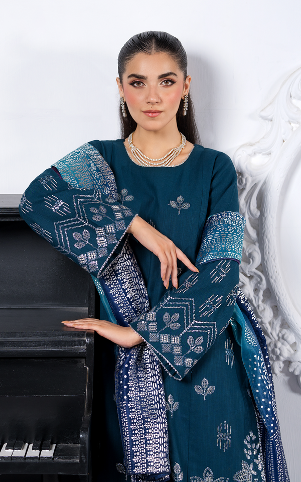 Emerald Dream Khaddar Embroidered Suit featuring elegant embroidery and stylish bell sleeves