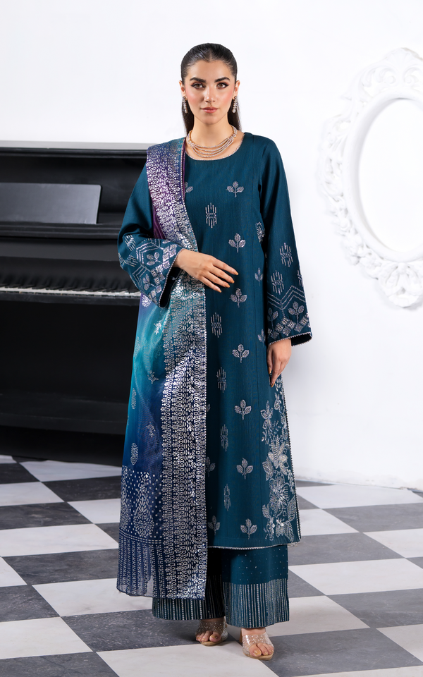 Elegant Emerald Dream Khaddar Embroidered Suit with intricate detailing and stylish scarf