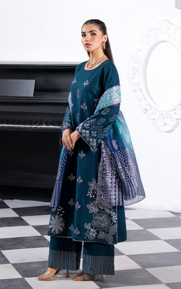 Emerald Dream Khaddar Embroidered Suit featuring intricate designs and elegant style for special occasions